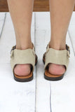 Minnetonka: Tangier Studded Leather Sandal {Stone}